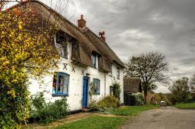 Thatched Cottage at Bythorn, Cambs, England Jigsaw Puzzle